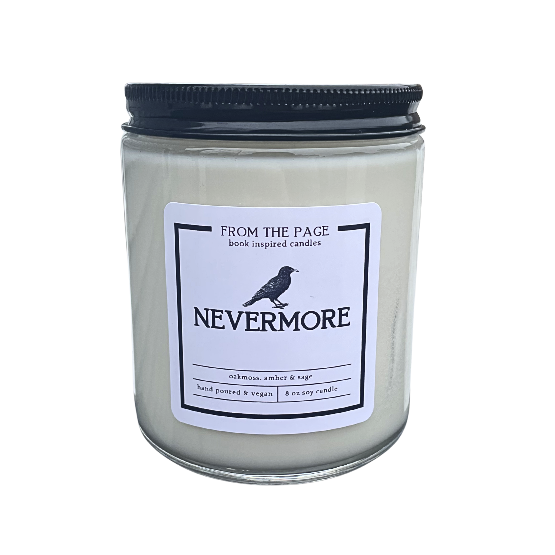 A white candle with the label "Nevermore" and a raven on the label. There is a white background.