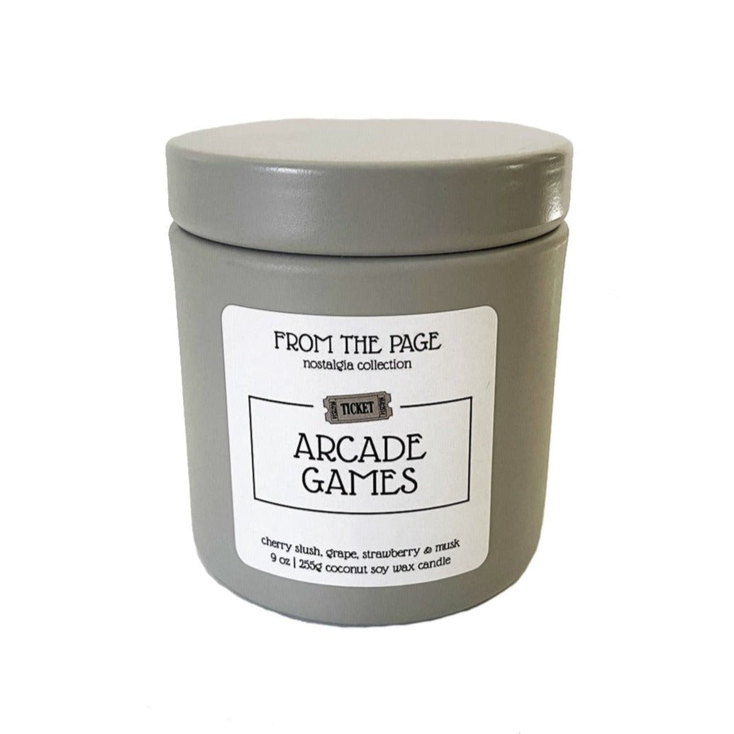Gray candle tin with label "Arcade Games"